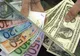 Dolarul s-a apreciat la maximul ultimelor nouă luni faţă de euro