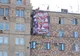 OBAMA, comparat cu cele "TREI MAIMUŢE ÎNŢELEPTE", într-un banner afişat pe o clădire din Moscova