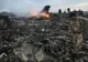 Noi rămășițe umane descoperite la locul prăbușirii MH17, potrivit premierului australian