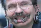 Bărbatul cu cele mai multe piercing-uri din lume nu a fost primit în Dubai 