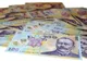 Suspecţii din dosarul de la Federaţia Română de Ciclism au adus la Poliţie O SACOŞĂ CU BANI