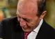 Băsescu a postat pe Facebook o fotografie de la botezul nepotului său