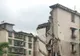 Clipe de groază! Un bloc de 9 etaje s-a prăbuşit, în China