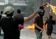 Grecia: Lupte de stradă între forţele de ordine şi protestatari antisistem