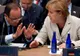 Merkel și Hollande cer convocarea unui summit al zonei euro pe tema crizei din Grecia