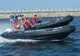 Un poliţist prins când lua mită a sărit în mare dintr-o barcă, pentru a scăpa de procurorii DNA