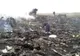 Avionul prăbuşit în Ucraina. S-au găsit fragmente din racheta BUK care ar fi doborât avionul MH17