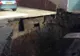 O groapă uriașă a apărut în mijlocul drumului. S-au speriat când au văzut ce era în ea