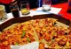 Descoperire dezgustătoare făcută de o tânără din Arad. Ce a găsit în pizza comandată