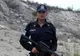 Şi-a dat jos cămaşa şi a pozat topless, cu arma în mână. Ce a păţit poliţista apoi