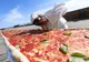 A fost realizată cea mai lungă pizza din lume! Cât măsoară și unde s-a înregistrat recordul