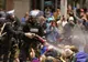 Protestele violente din Washington. Poliţişti răniţi, persoane reţinute 