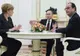 Situația din Ucraina, discutată telefonic de către Hollande, Merkel și Putin
