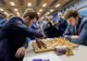Egalitate în partida III a meciului pentru titlul mondial dintre Magnus Carlsen și Serghei Kariakin 