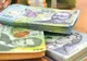 Patronii atacă Guvernul: "Nu mai putem plăti salariile la timp!"