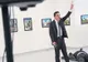 Ce s-a întâmplat cu fotograful care a surprins poza cu asasinul ambasadorului rus în Turcia