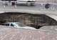 Un crater apărut pe drumul E85 a devenit obiectiv turistic. Ce ascunde în interior
