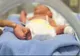 Imagini revoltătoare: Bebeluş învineţit de medici: S-au chinuit 30 de minute să...