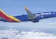Avion american deturnat. O femeie încercat să deschidă ușa avionului în timpul zborului