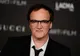 Regizorul Quentin Tarantino s-a logodit cu o cântăreață cu 21 de ani mai tânără! Iată cum arată