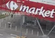 Bărbat găsit spânzurat de gardul unui magazin Carrefour
