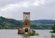 VIDEO. Biserica înghiţită pe jumătate de un lac de acumulare, pusă la pământ de o furtună puternică