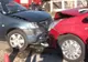 Copil de 10 ani, prins între două mașini după un accident frontal