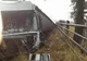 Accident cumplit. Un TIR cu 20 de tone de parchet s-a răsturnat peste o mașină