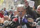 Liviu Dragnea, flancat de protestatari şi de o pereche de cătuşe la ICCJ: "Mă lăsaţi să trec?"
