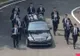 Imagini fabuloase. 12 bodyguarzi au alergat lângă limuzina lui Kim Jong-un, fără să obosească