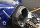 Aterizare de urgenţă în SUA, după o explozia unui motor. O persoană a murit
