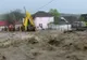 COD ROŞU de inundaţii în cinci judeţe: Zeci de gospodării inundate şi drumuri distruse de viituri