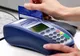 Noua lege a "bancomatelor" din magazine intră în vigoare vineri. Ce comision plătești dacă vrei cash