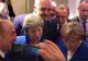 Imagini virale: Merkel, Erdogan și Theresa May se uită la meciul Croația-Anglia pe un telefon