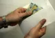Poliţist sibian, reţinut de DNA Alba Iulia, după ce a luat mită