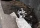 Bărbat găsit decedat. O bucată de beton, dintr-un podeț, a căzut peste el