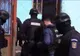 Jandarm rănit grav în timpul percheziţiilor la o reţea de falsificatori de carduri 