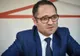 Ministrul Sportului, surprins când își aprindea țigara, în Parlament. Cum își explică gestul