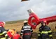 Șofer preluat de elicopterul SMURD după ce mașina sa a fost lovită de un tren – FOTO