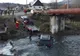 Au vrut s-o ia pe "scurtătură", dar au rămas cu mașina în mijlocul râului. Șocant ce a urmat!