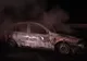 Mașină mistuită de flăcări, într-o parcare pentru TIR-uri. Cauza incendiului