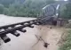 Panică în jud. Suceava. Un pod feroviar a fost luat de ape