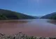 Apa unui lac din România s-a înroșit, peste noapte. Cum se explică fenomenul 