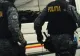 Spionaj în stil mafiot. Șef de la Crimă organizată, arestat pentru șantaj și răpire