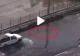 VIDEO Strada părea inundată însă șoferul a crezut că poate trece. Ce a apărut din apă, din senin, e șocant