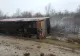 FOTO Plan roșu de intervenție în Caraș Severin. Un autocar cu 16 pasageri s-a răsturnat