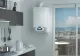Lovitură pentru cei care au centrale termice de apartament. Coșurile de fum individuale vor fi interzise!