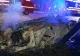 VIDEO - Pericol de explozie după ce o mașină a luat foc chiar în trafic, pe un pod - Trafic blocat - zeci de mașini oprite