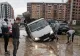 VIDEO Ploile au transformat Chiajna într-o mlaștină uriașă. Mai multe mașini și un TIR, blocate în gropile apărute în carosabil