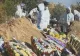 Imaginile dezastrului Covid: groparii nu mai fac față, se fac gropi cu excavatorul 